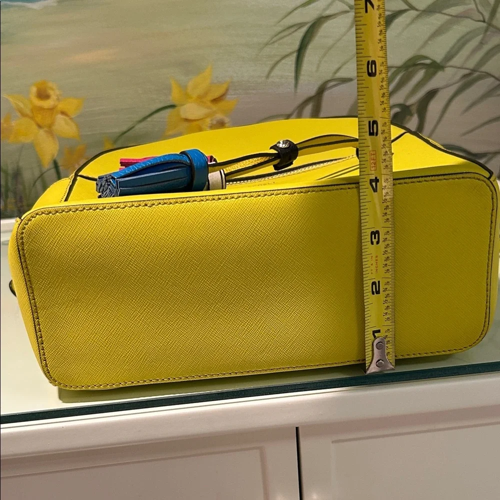 Henri Bendel West 57th Yellow Saffiano Leather Backpack with Colorful Tassels